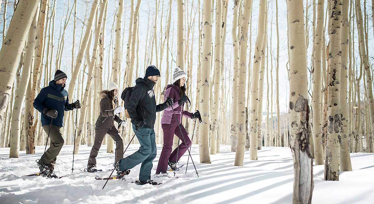 Friends on a snowshoe hike in beaver creek colorado 1200x800