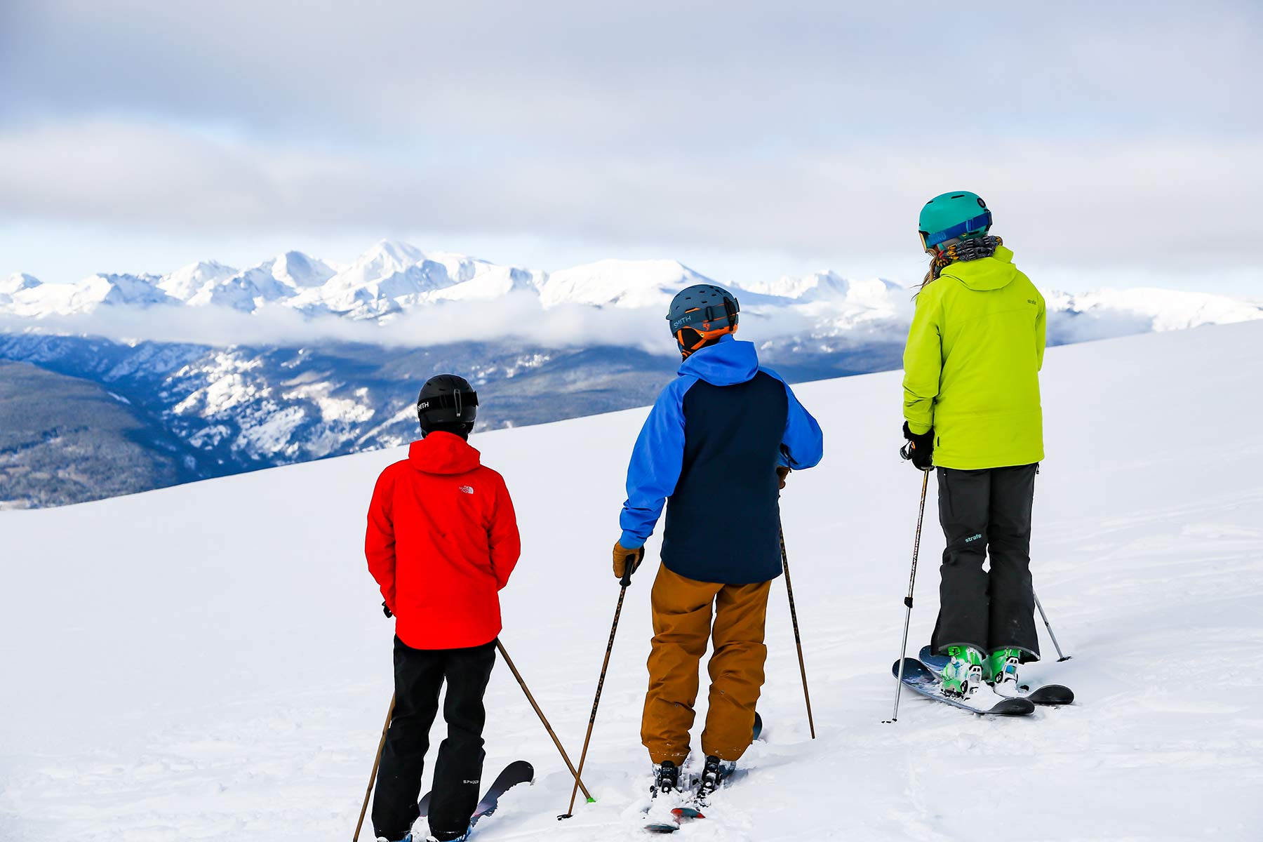 Three skiers on Vail Mountain